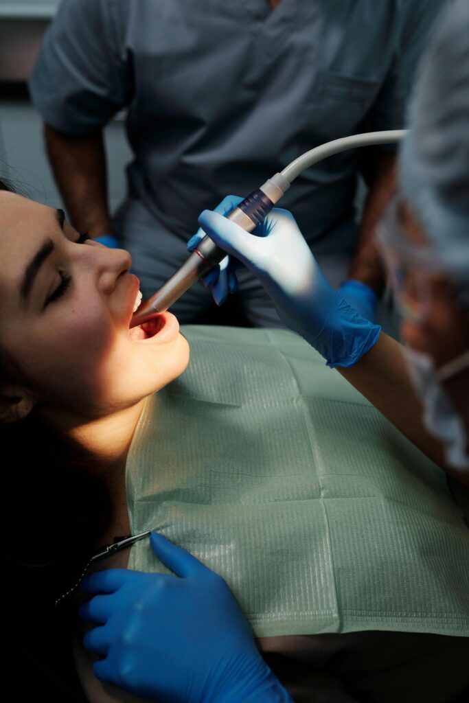 pexels-photo-4269943-4269943 Close-Up Shot of Woman Having a Dental Treatment