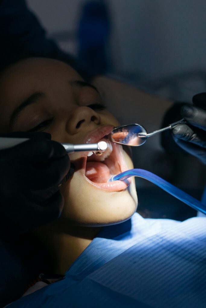 pexels-photo-6502553-6502553 Close-Up Shot of a Kid Having Dental Checkup